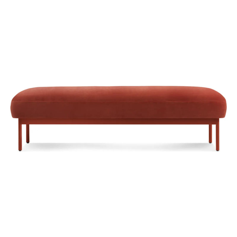 The Puff Puff Bench from Blu Dot with tomato velvet upholstery.