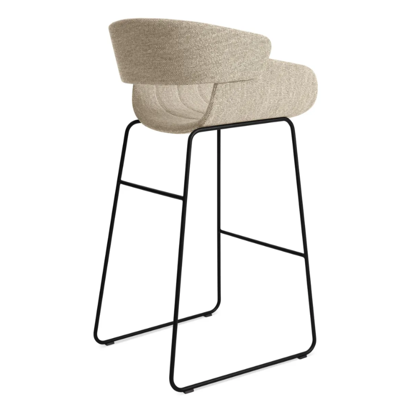 The Racer Bar Stool from Blu Dot with Tait Stone upholstery from the back at an angle.