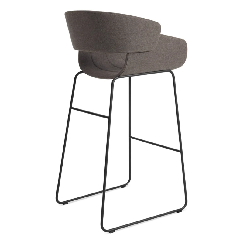 The Racer Bar Stool from Blu Dot with Toohey Charcoal upholstery from the back at an angle.