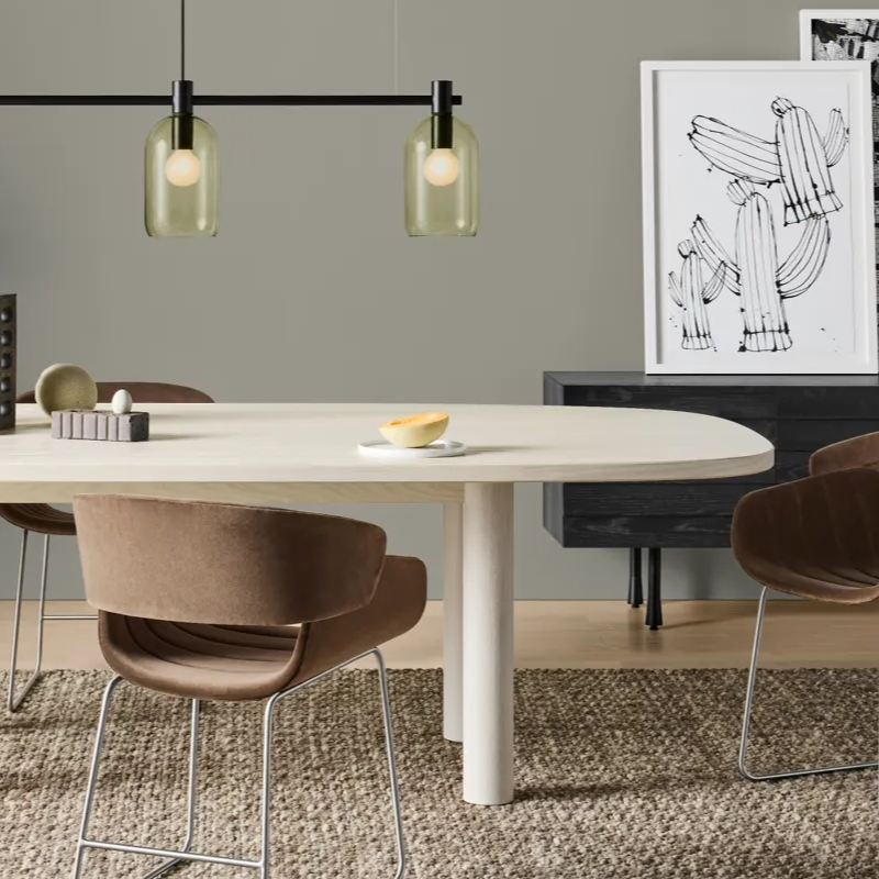 The Racer Chair from Blu Dot with Coffee Velvet upholstery in a family room.