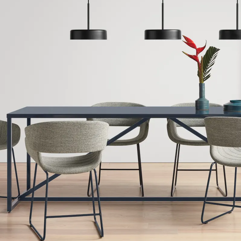 The Racer Chair from Blu Dot with Tait Marine upholstery in a dining room.