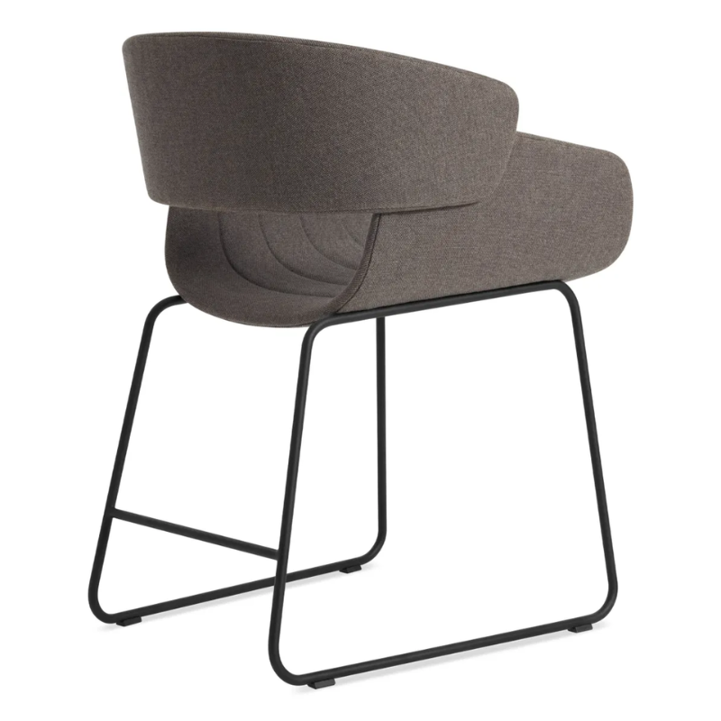 The Racer Chair from Blu Dot with Toohey Charcoal upholstery from the back at an angle.