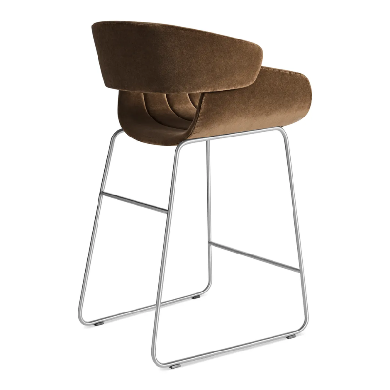 The Racer Counter Stool from Blu Dot in Coffee Velvet upholstery from the back at an angle.