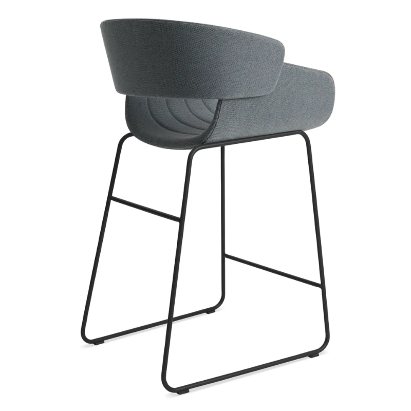 The Racer Counter Stool from Blu Dot in Maharam Mode in Machine upholstery from the back at an angle.