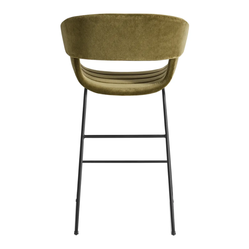 The Racer Counter Stool from Blu Dot in Moss Velvet upholstery from the back.