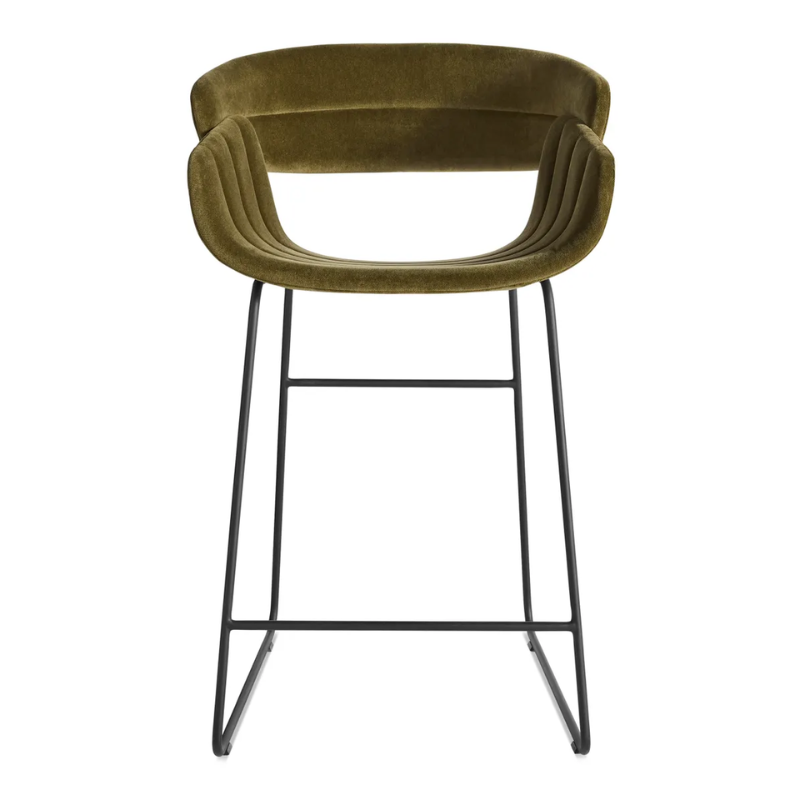 The Racer Counter Stool from Blu Dot in Moss Velvet upholstery.