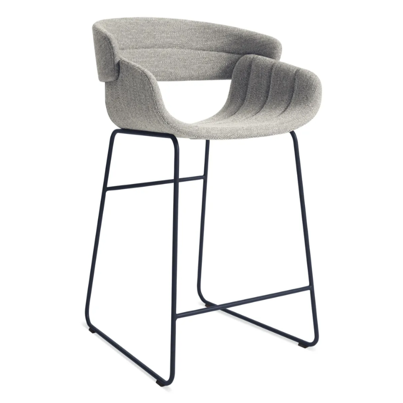 The Racer Counter Stool from Blu Dot in Tait Marine upholstery from an angle.