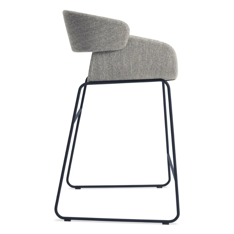 The Racer Counter Stool from Blu Dot in Tait Marine upholstery from the side.