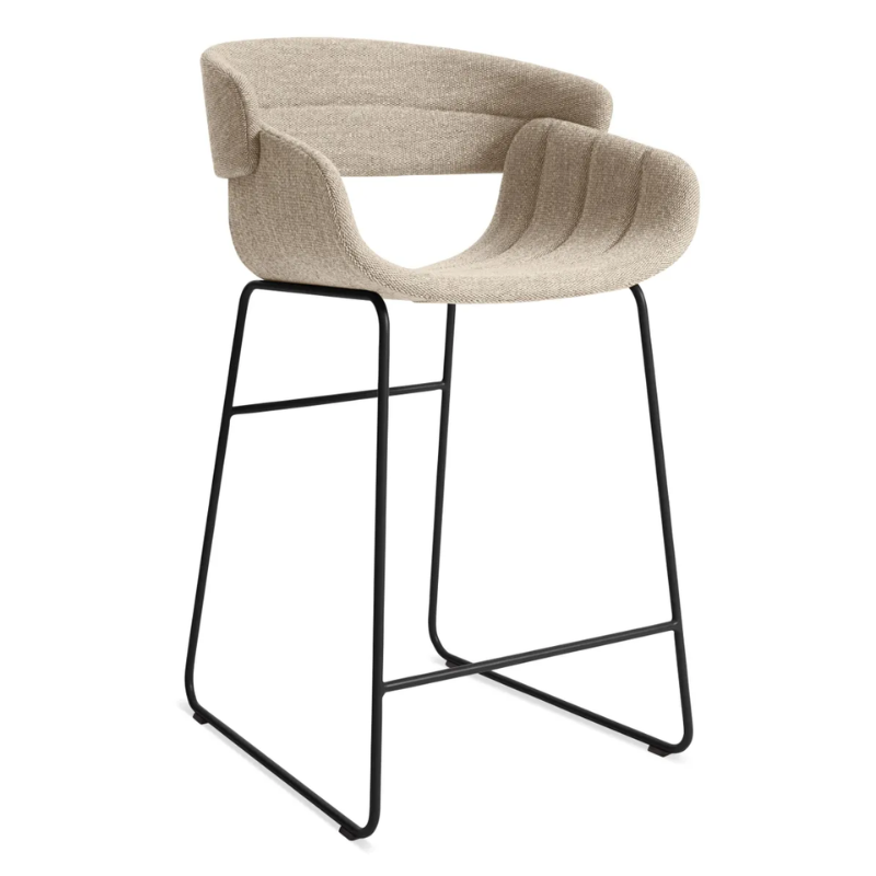 The Racer Counter Stool from Blu Dot in Tait Stone upholstery from an angle.