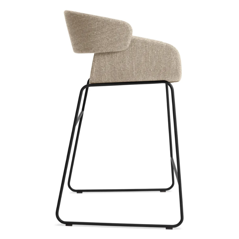 The Racer Counter Stool from Blu Dot in Tait Stone upholstery from the side.