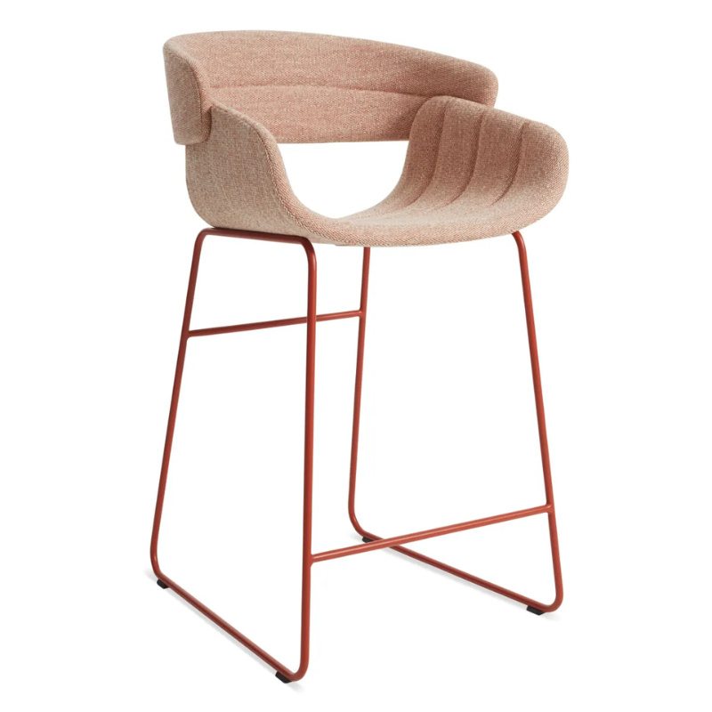 The Racer Counter Stool from Blu Dot in Tait Tomato upholstery from an angle.
