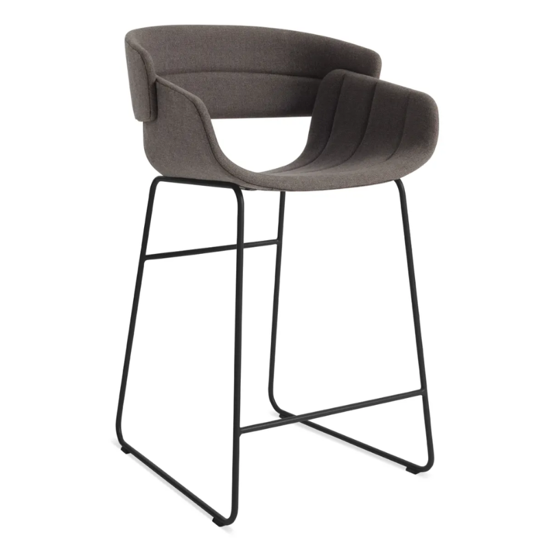 The Racer Counter Stool from Blu Dot in Toohey Charcoal upholstery from an angle.