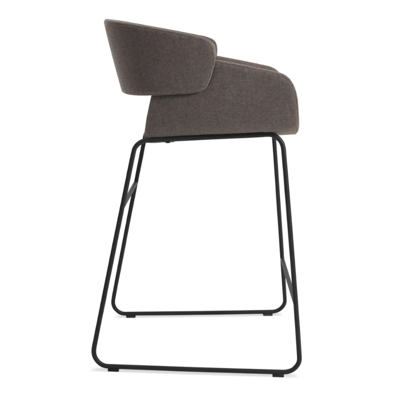 The Racer Counter Stool from Blu Dot in Toohey Charcoal upholstery from the side.