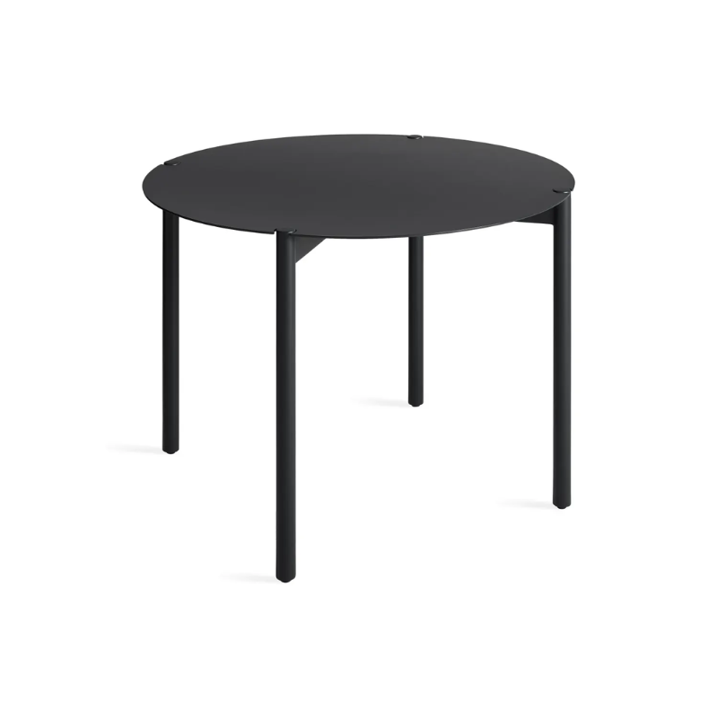 The Round Comeuppance Dining Table from Blu Dot in oblivion from an angle.