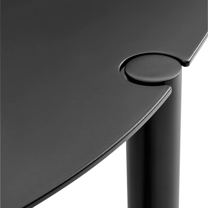 The Round Comeuppance Dining Table from Blu Dot in oblivion corner.