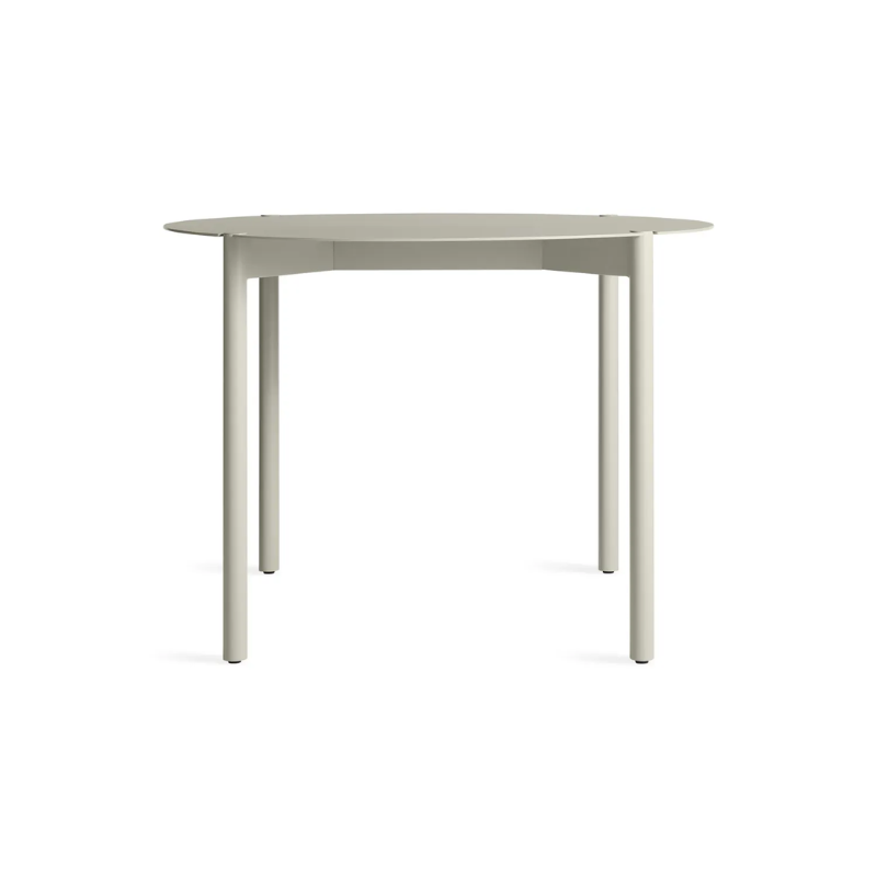 The Round Comeuppance Dining Table from Blu Dot in putty.