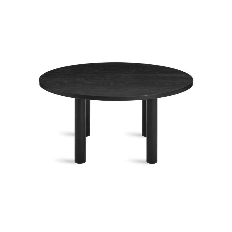 The Round Good Times Dining Table from Blu Dot in black on ash from a high angle.