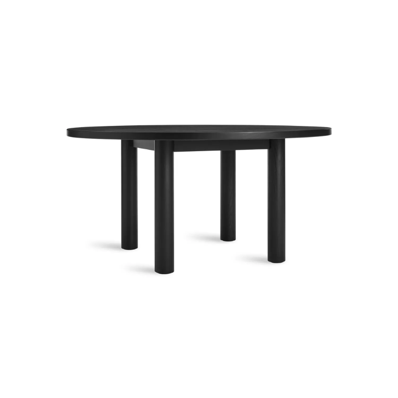The Round Good Times Dining Table from Blu Dot in black on ash from the side.