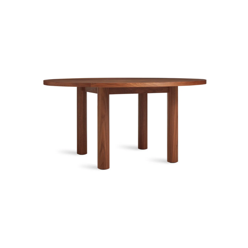 The Round Good Times Dining Table from Blu Dot in walnut from the side.