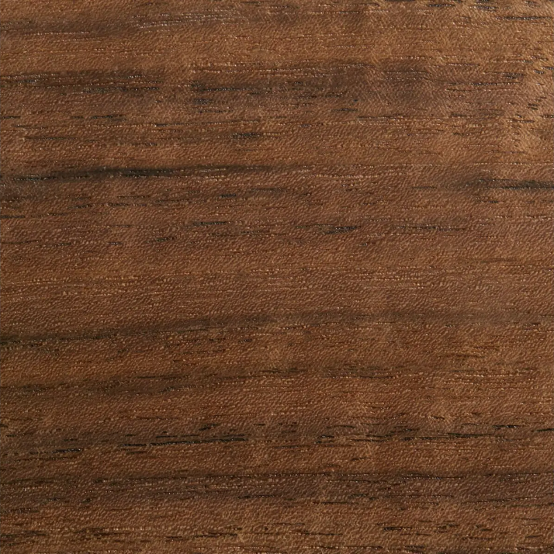 The Round Good Times Dining Table from Blu Dot in walnut swatch.