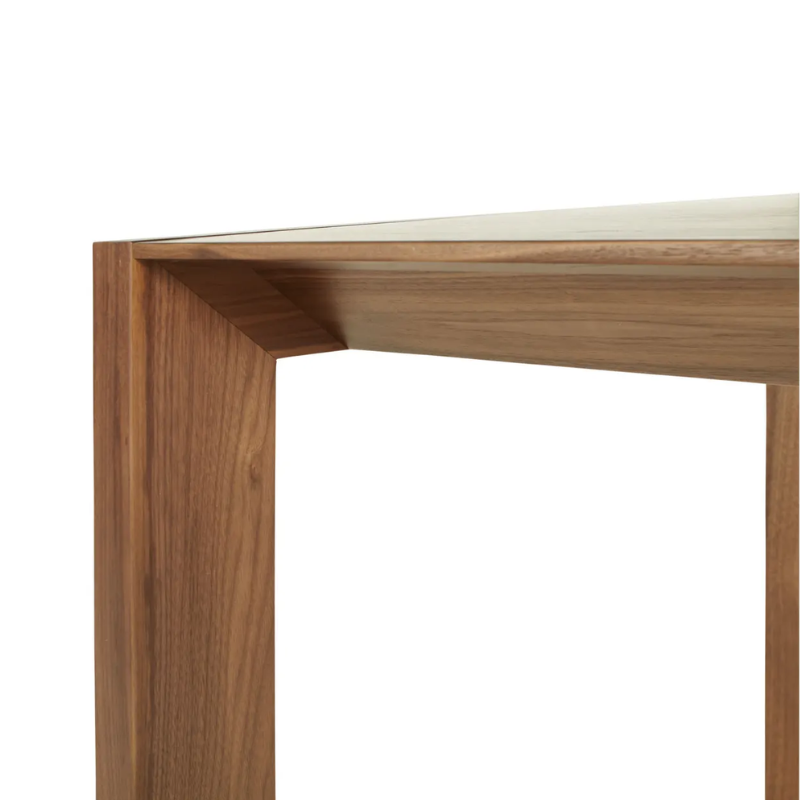 The 76 inch Second Best Wood Dining Table from Blu Dot focusing on the craftsmanship.
