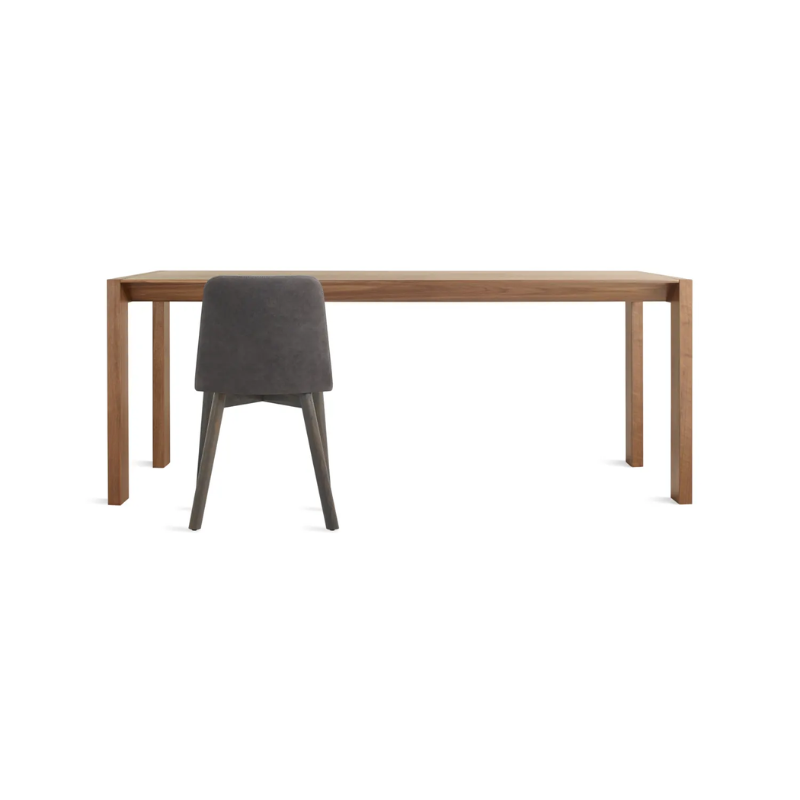 The 76 inch Second Best Wood Dining Table from Blu Dot in a studio.