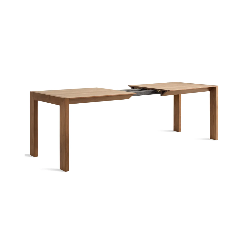 The Second Best Wood Extendable Dining Table from Blu Dot extending from an angle.