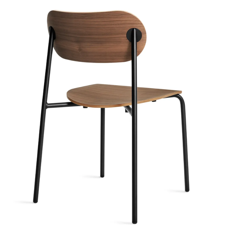 The SideBySide Chair from Blu Dot in walnut from the back at an angle.