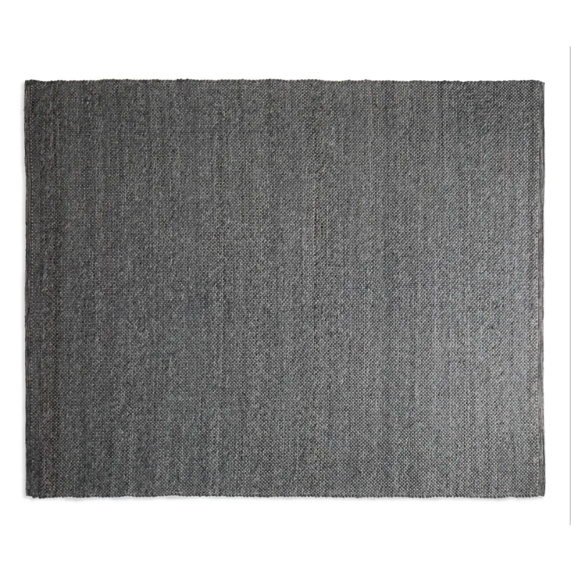 The eight by ten foot Sinder Rug from Blu Dot in Charcoal handwoven wool.