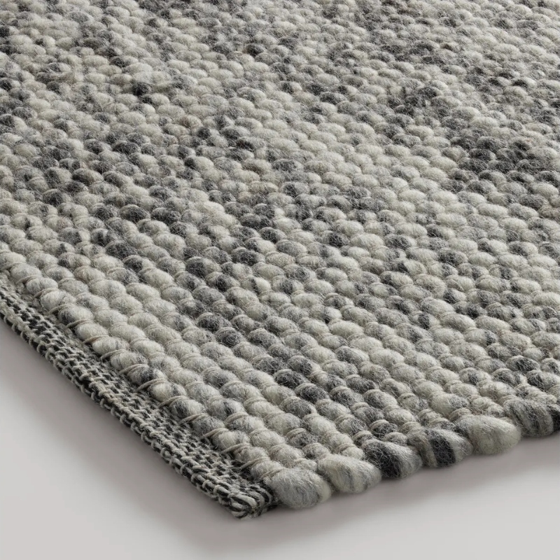 The Sinder Rug from Blu Dot in Grey handwoven wool close up.
