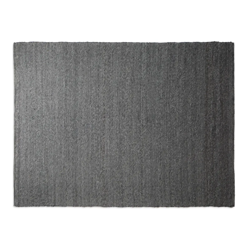 The nine by twelve foot Sinder Rug from Blu Dot in Charcoal handwoven wool.