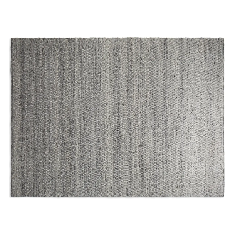 The nine by twelve foot Sinder Rug from Blu Dot in Grey handwoven wool