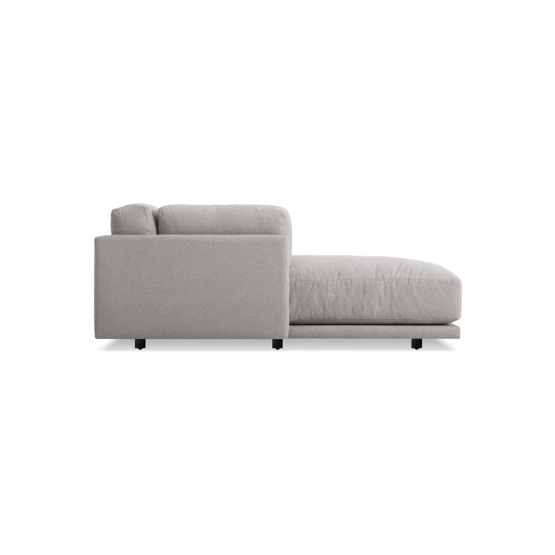 The left Sunday Chaise by Blu Dot in agnew grey from the side.