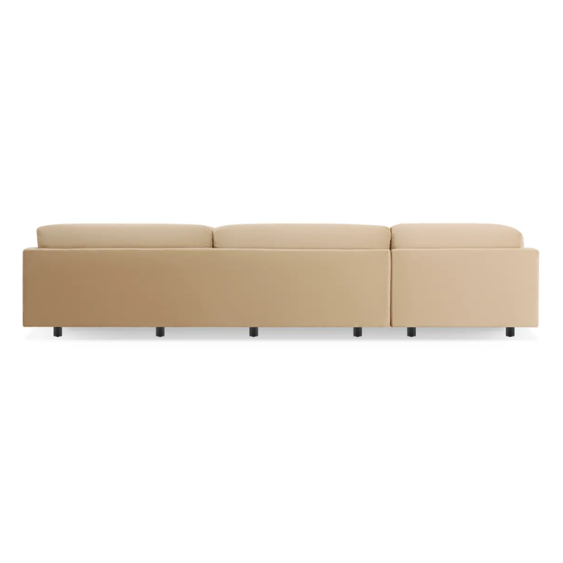 The Sunday L Sectional Sofa by Blu Dot in camel velvet with left chaise from the back.