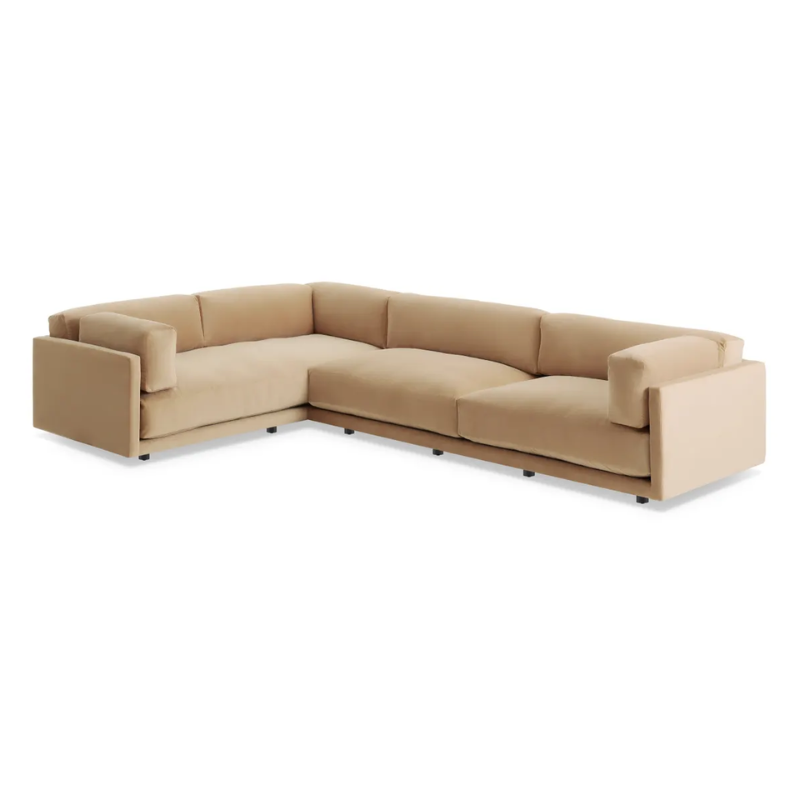 The Sunday L Sectional Sofa by Blu Dot in camel velvet with left chaise from a high angle.