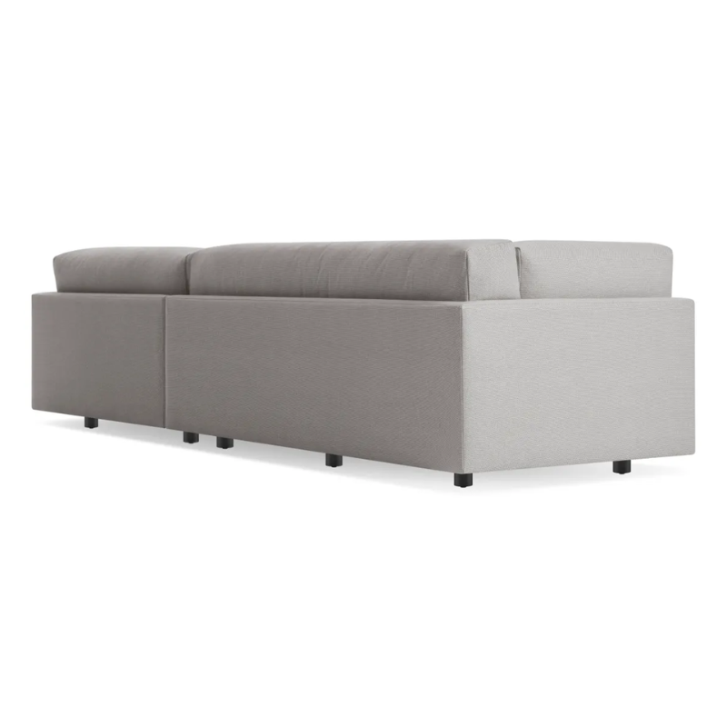 The Sunday Small Sofa with Chaise by Blu Dot in agnew grey with right chaise from a rear angle.