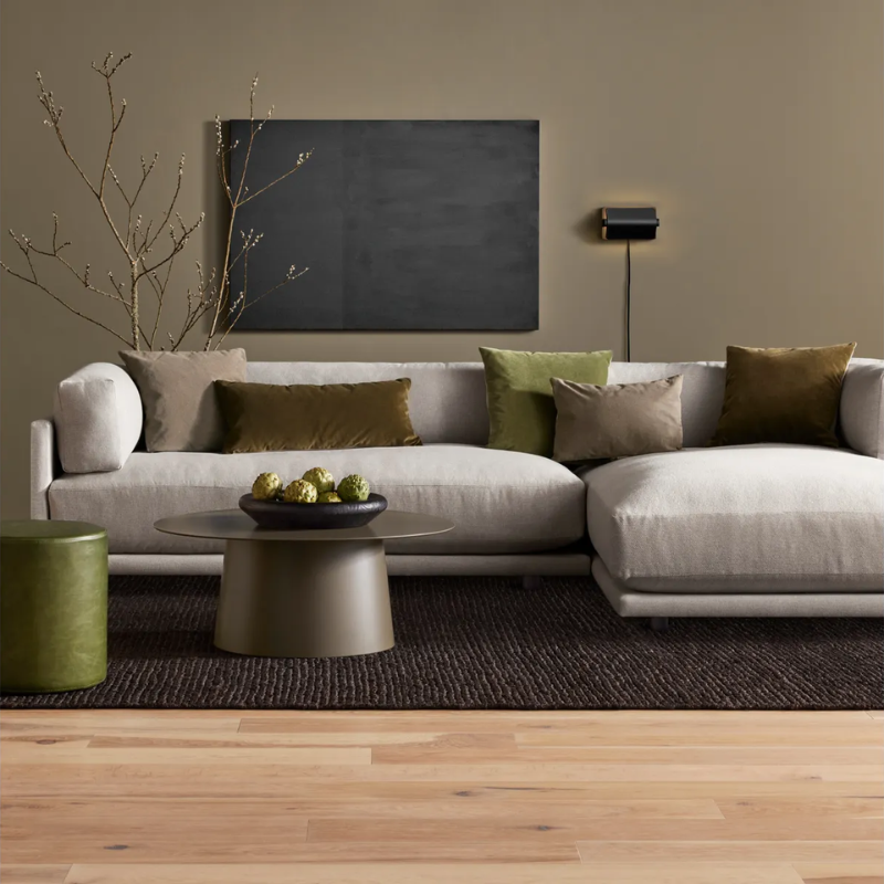 The Sunday Small Sofa with Chaise by Blu Dot in a living room.