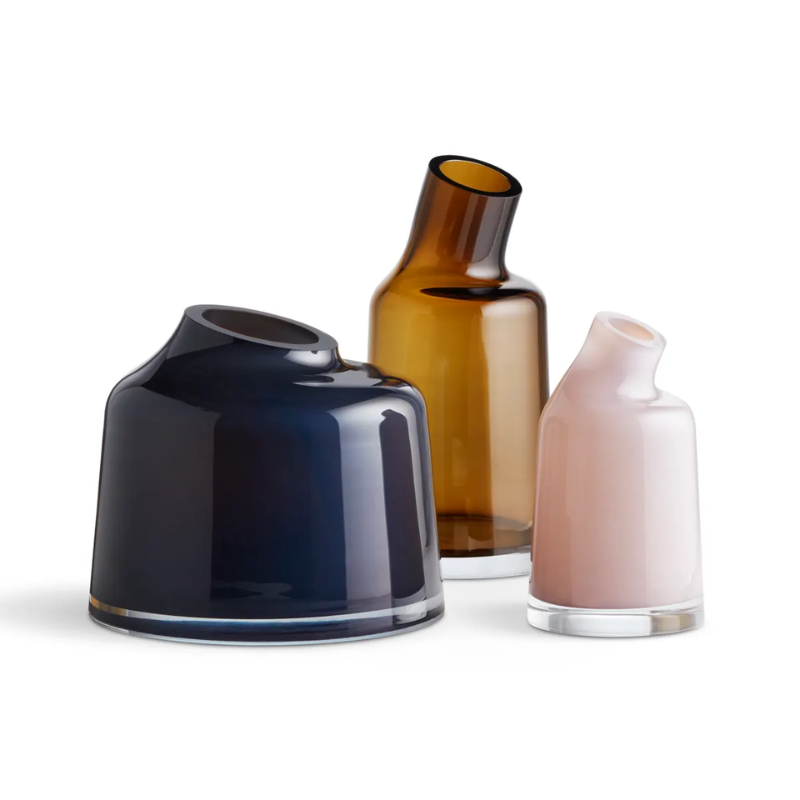 The Variant Large Glass Vase from Blu Dot with the other pieces in the collection.