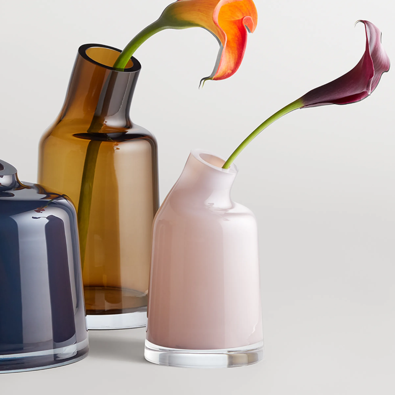 The Variant Small Glass Vase from Blu Dot close up in a studio.