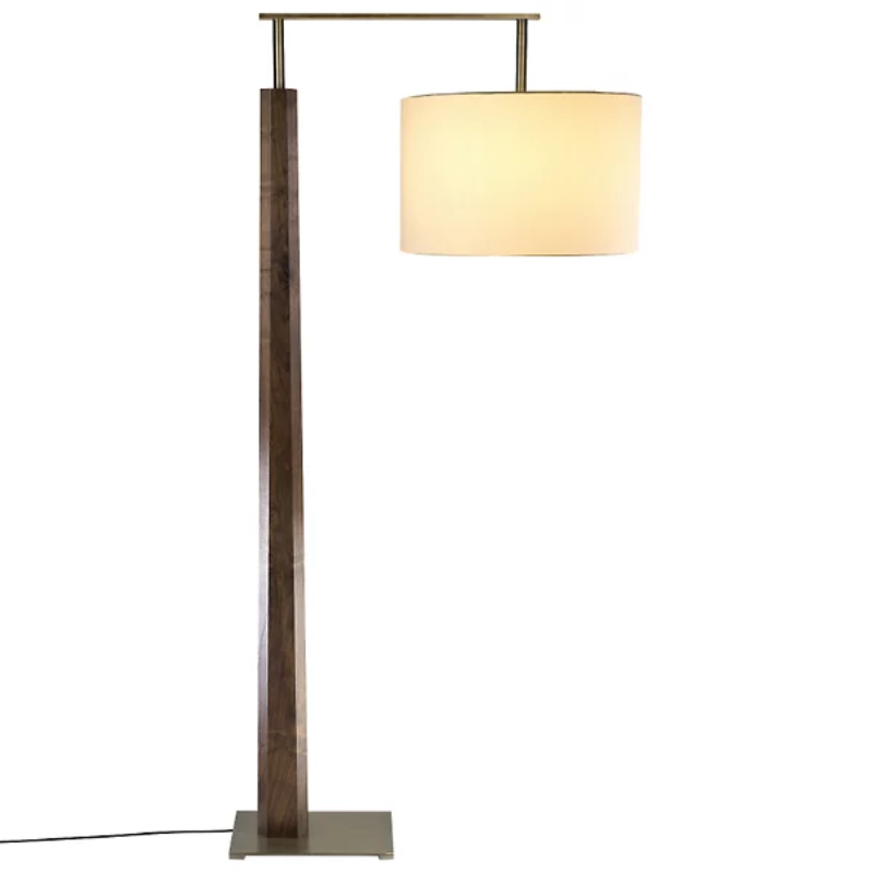 The Altus Floor Lamp from Cerno in walnut with distressed brass metal and white linen shade.