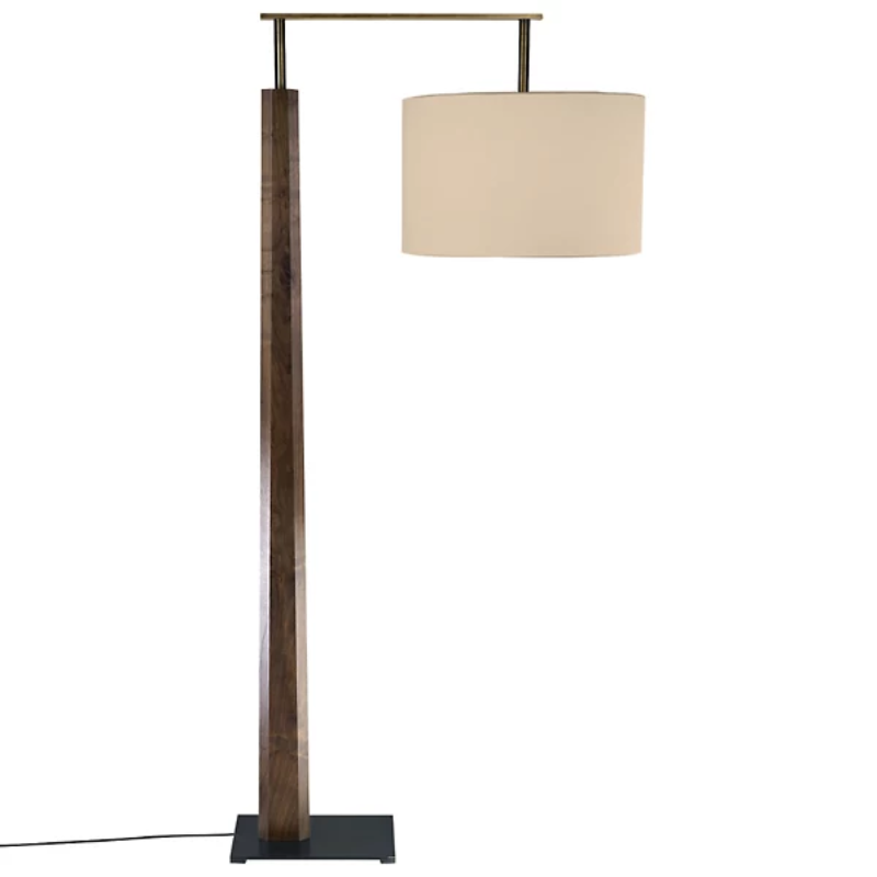 The Altus Floor Lamp from Cerno in walnut with oiled bronze metal and burlap shade.