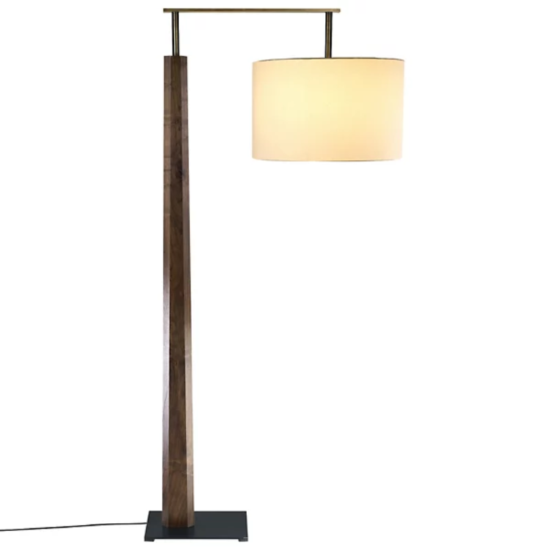 The Altus Floor Lamp from Cerno in walnut with oiled bronze metal and white linen shade.