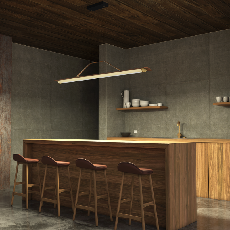 The Penna Linear Pendant from Cerno above a bar.