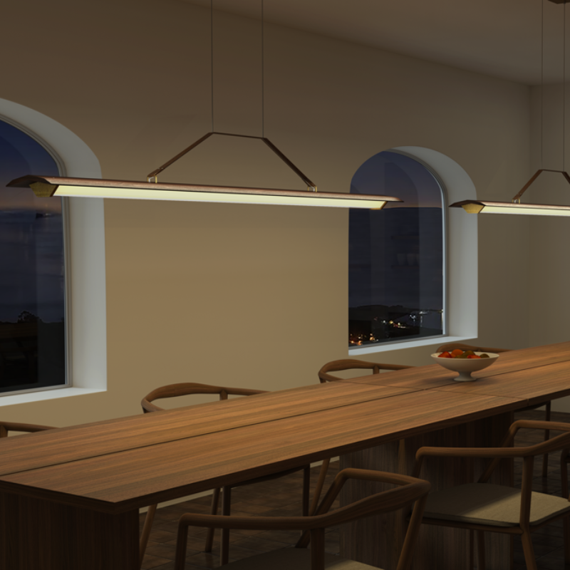 The Penna Linear Pendant from Cerno in a dining area.