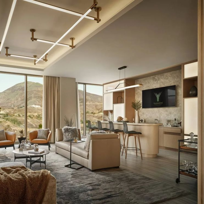 The Penna Linear Pendant from Cerno in a living room.