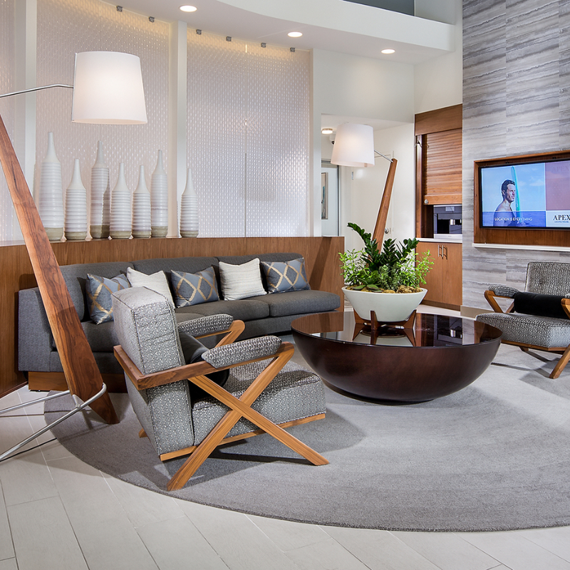 The Silva Giant Floor Lamp from Cerno in walnut in a living space.