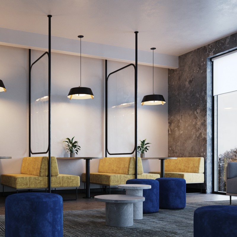 The Small Casia Pendant from Cerno in dark stained walnut in a lounge space.