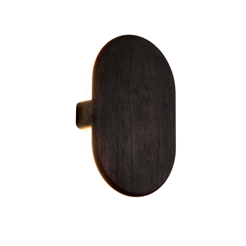 The Tempus Wall Sconce from Cerno in dark stained walnut.