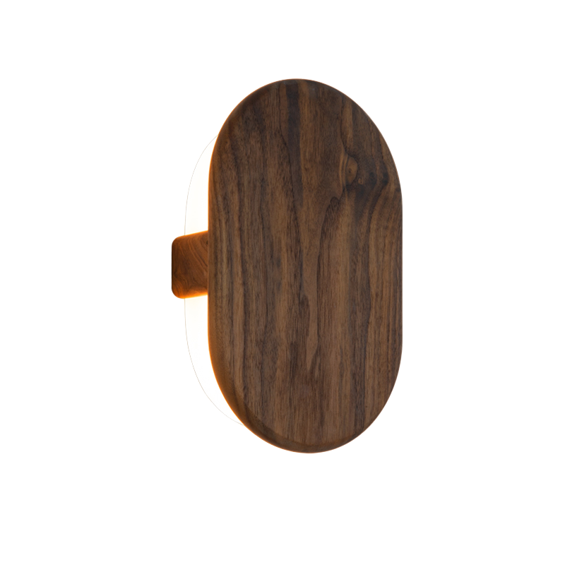 The Tempus Wall Sconce from Cerno in walnut.