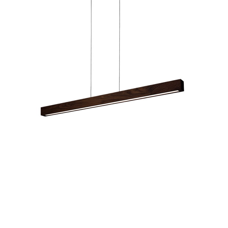 The Una LED Linear Suspension – Uplight and Downlight from Cerno in dark stained walnut from an angle.
